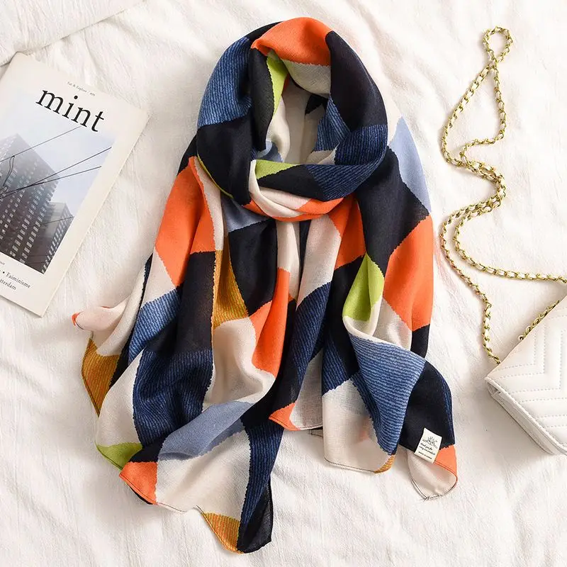Schal Damen lang mit grafischem Muster und breitem Rand – Bunt – orange-blau